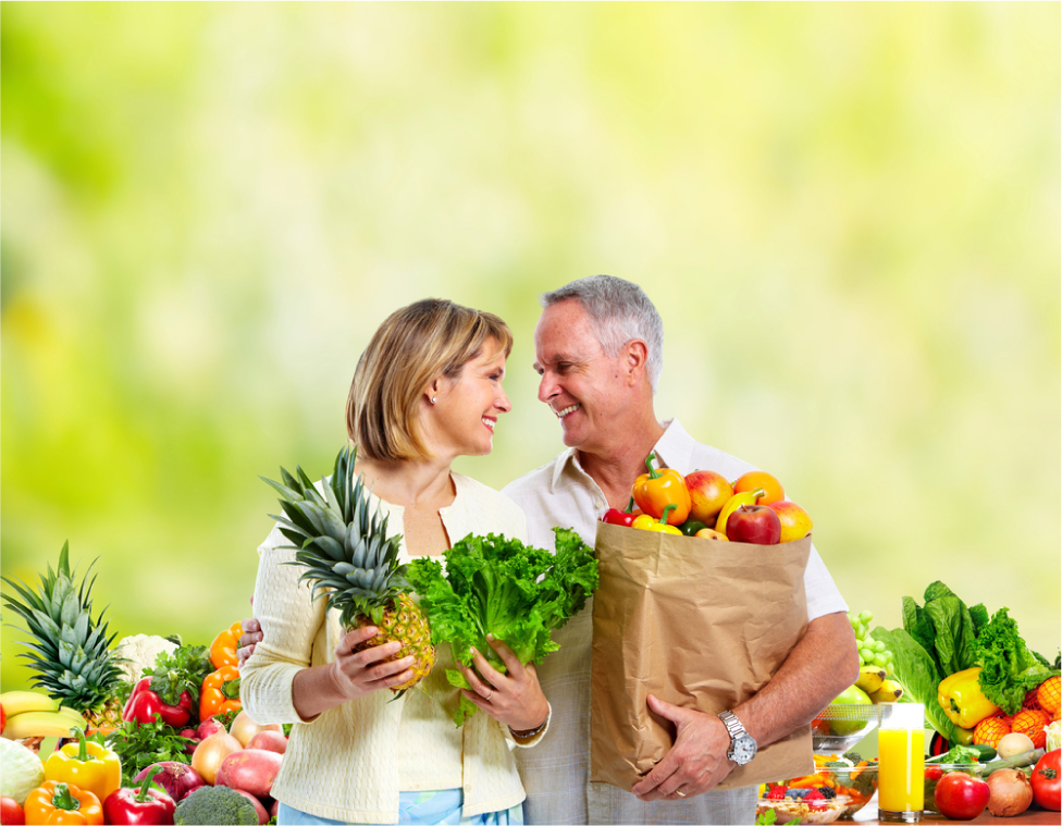 People with Vegetables over green background. Healthy diet.